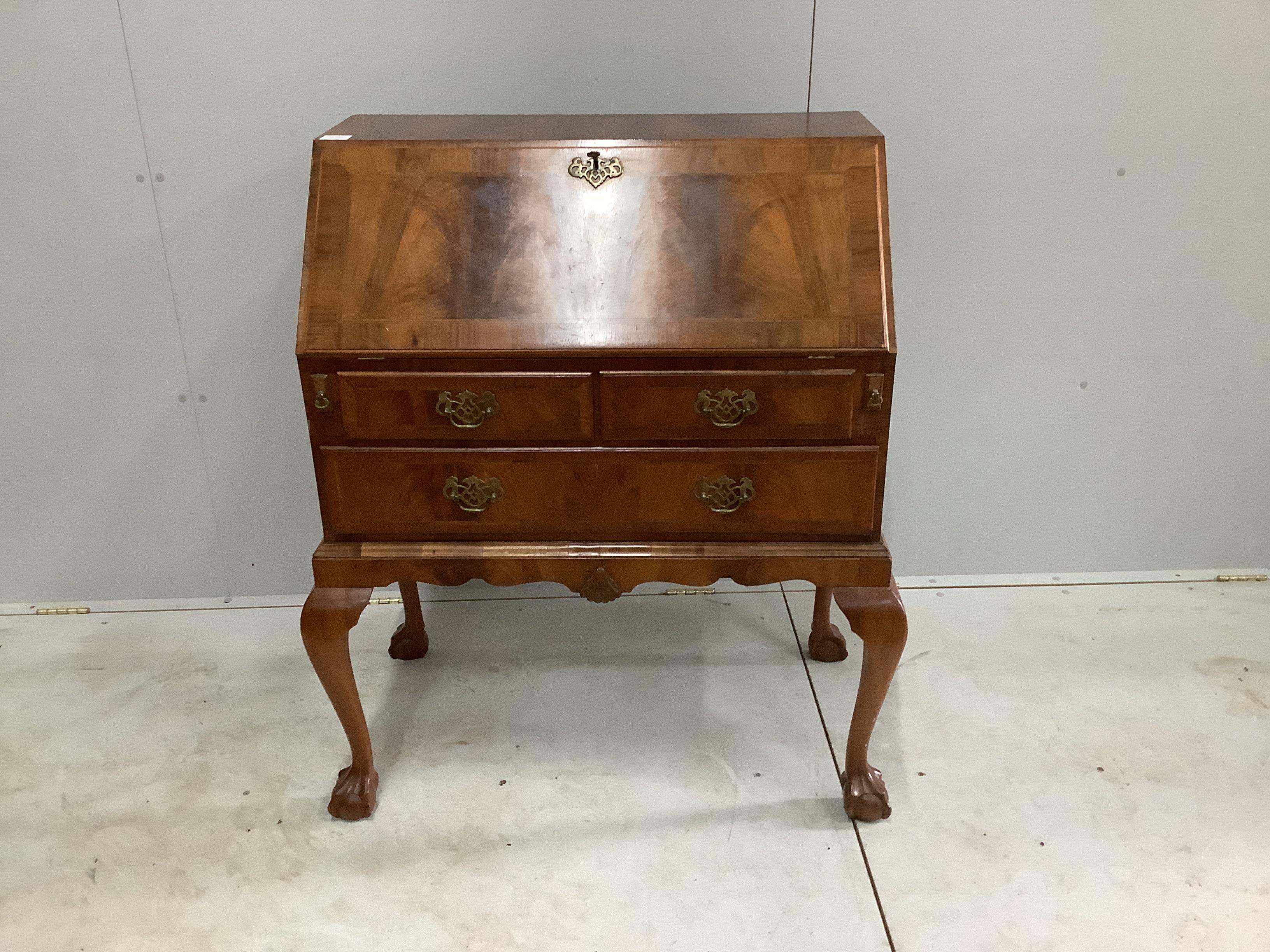 A Queen Anne revival feather banded walnut bureau, width 82cm, depth 49cm, height 105cm